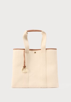 Beežist kangast poekott pruunide nahkdetailide, kahe sangaga ning väikese riputatud nahkrihmaga, millel on kuldne rõngasdetail.