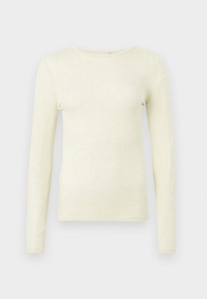 Haut à manches longues en tissu jaune clair doux. Il présente un col rond et une coupe ajustée, avec une texture lisse et des détails de couture minimalistes.