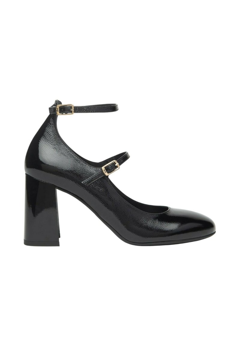 Scarpe nere con tacco alto, finitura lucida, punta arrotondata e cinghie alla caviglia con fibbie dorate. Design con tacco grosso per maggiore stabilità.