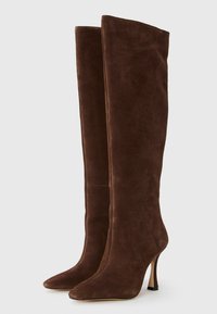 Brown suede knee-high boots with pointed toe and stiletto heel. Smooth texture, minimalist design, and no visible hardware or accents.