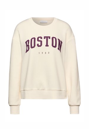 Kremowy sweatshirt o luźnym kroju, z napisem „BOSTON” w ciemno-maroonowych literach oraz „1980” mniejszym tekstem poniżej.