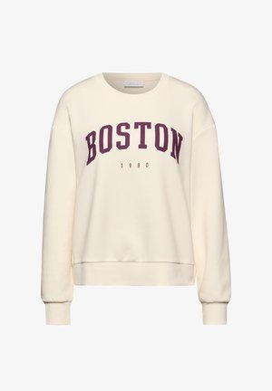 Sweatshirt couleur crème avec une coupe décontractée, arborant "BOSTON" en lettres bordeaux foncé et "1980" en dessous en texte plus petit.