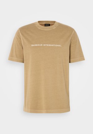 Μπεζ βαμβακερό T-shirt με κοντά μανίκια και στρογγυλή λαιμόκοψη, που διαθέτει λευκό κείμενο "BARBOUR INTERNATIONAL" στο στήθος. Λείο υλικό.