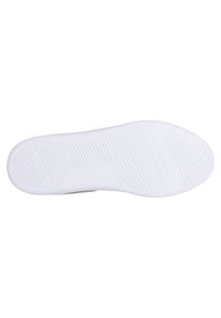 White sneaker sole featuring a textured surface with horizontal and vertical ridges for traction, curved heel, and smooth edges.
