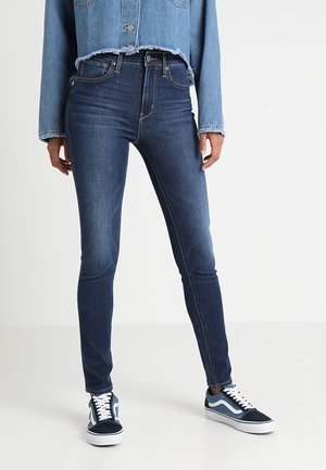 Vaqueros pitillo - rinsed denim