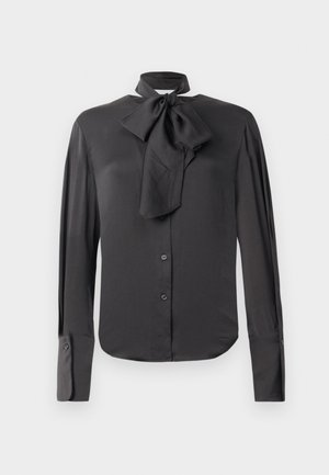 Black blouse in smooth fabric, featuring a bow tie collar, full-length sleeves, button front, and cuff details.