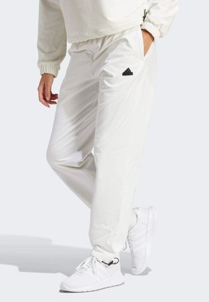 CITY ESCAPE - Tracksuit bottoms - off white