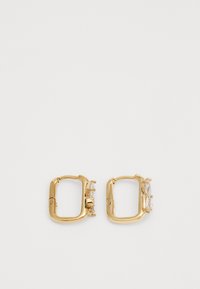 Gold square hoop earrings featuring three clear gemstones on one side and a polished texture. The design is minimalist and geometric.