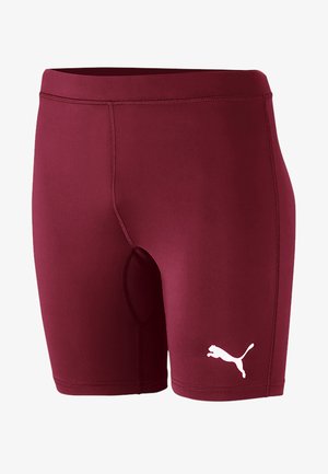 Shorts atletici bordeaux realizzati in tessuto elasticizzato, con un design aderente e il logo Puma bianco in basso a destra.