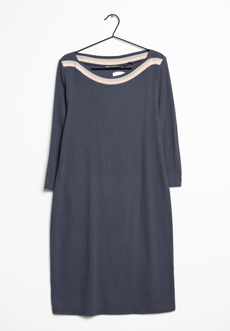 Šedé šaty s dlouhým rukávem a kulatým výstřihem, vyrobené z texturované látky, s béžovým proužkem přes ramena. Věší se na černém háčku.