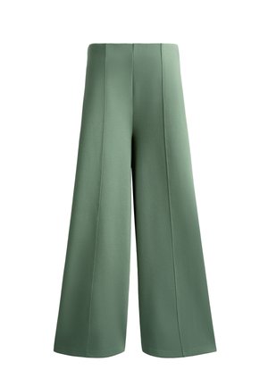 Pantaloni a gamba larga in un tessuto verde tenue, con cuciture a vista e vita alta. Tessuto liscio senza hardware o motivi visibili.