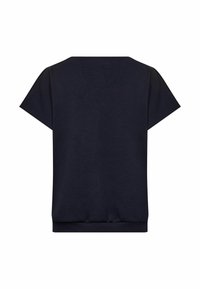 Námořnická modrá krátkosrstá tričko vyrobené z měkké bavlny, má uvolněný střih a na spodním lemu žebrovaný design pro zvýšení stylu.