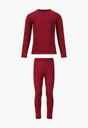 Ensemble thermique rouge comprenant un haut à manches longues et un pantalon ajusté, avec une texture douce et des poignets côtelés. Marquage minimal au bas.