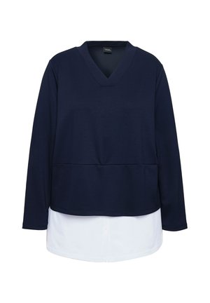 Marineblauw longsleeve top met een v-hals en een gelaagde witte shirtzoom. Het materiaal lijkt zacht met een gladde textuur en een ontspannen pasvorm.