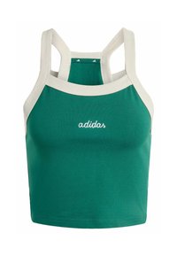 Zelený skrátený top z bavlny s širokým krémovým rebrovaným výstrihom a ramienkami. Na ňom je vyšitý biely logo "adidas".
