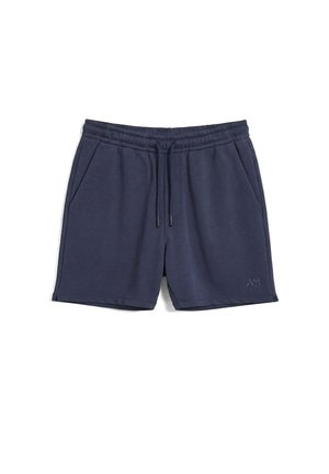 Pantaloncini blu navy con vita elastica, coulisse, tasche laterali e piccolo logo vicino all'orlo inferiore sulla gamba destra.