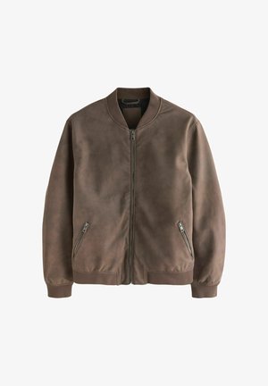 Pruun seemisnahast pommitajate jakk esiluku ja lukuga küljetaskutega, soonikkoes krae, mansetid ja alumine äär.