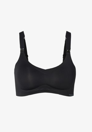 Sort trådløs BH lavet af glat stof, med justerbare stropper, et sømløst design og en blød, buet form. Uden polstring eller bøjler.