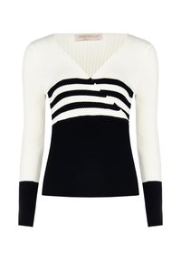 Maglione a coste in bianco e nero con scollo a V, caratterizzato da strisce orizzontali sul petto e una parte inferiore nera uniforme, maniche lunghe aderenti.
