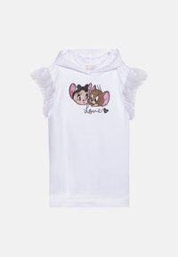 Vit ärmlös topp med huva, rynkade detaljer på axlarna och en glittrig grafik av två tecknade figurer med texten "Love".