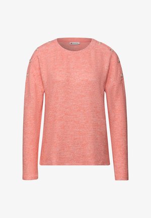 Růžový pletený svetr s dlouhými rukávy, kulatým výstřihem a dekorativními knoflíky na ramenou. Textura je měkká a mírně melírovaná.