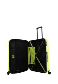 Hard-shell suitcase in bright lime green with a black interior. Features include cross straps and pocket for organization, extendable handle, and wheels.