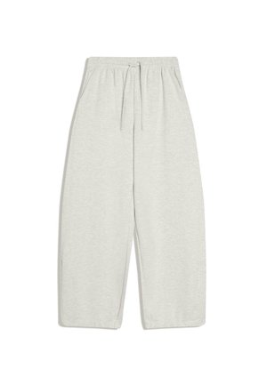 Světle šedé, volné tepláky z měkké bavlněné směsi, s elastickým pasem s nastavitelným šňůrkovým stahováním a bočními kapsami.