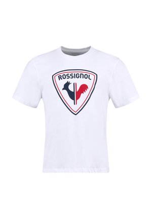 T-shirt bianco in cotone con logo centrale Rossignol in nero e rosso, contornato di nero. Maniche corte con un design classico a girocollo.