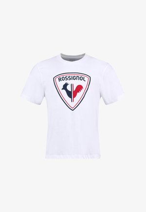 Witte katoenen T-shirt met een centraal Rossignol-logo in zwart en rood, omrand met zwart. Korte mouwen met een klassiek ronde halsontwerp.