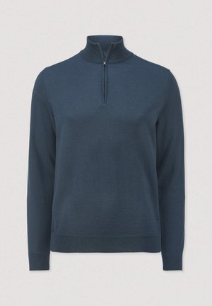 Marineblaue Strickjacke mit langen Ärmeln, hohem Kragen und Reißverschluss am Hals; glatte Textur und taillierte Passform.