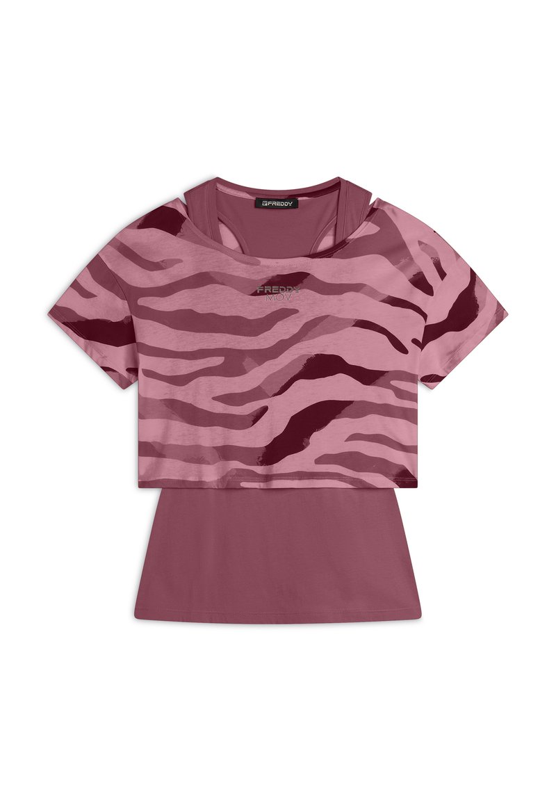 T-shirt accorciato bicolore con motivo a strisce di tigre rosa e borgogna. Materiale in misto cotone, maniche corte e scollatura tonda.