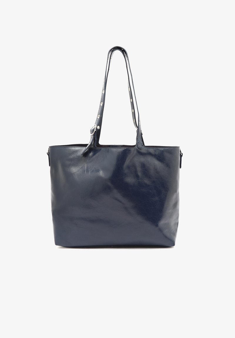 Borsa tote in pelle blu navy con una texture liscia, due manici lunghi e accessori decorativi in argento sulle cinghie. Tasca laterale con zip.