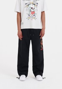 Ed Hardy - SNAKE-VIPER TECH - Tracksuit bottoms - black Thumbnail Image 1