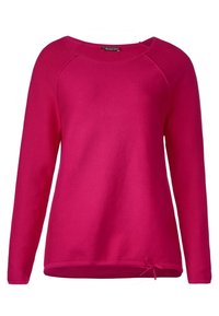 Jersey de manga larga en fucsia con escote redondo, puños acanalados y detalle de lazo en el lateral del dobladillo. Textura suave de punto, ajuste casual.