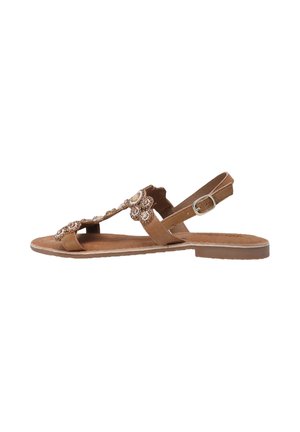 Brown sandal with a flat sole, decorative floral beading along the straps, adjustable back strap, and soft suede texture.