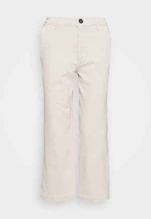 Beige broek met wijde pijpen, gemaakt van een katoenmix. Heeft een knoopsluiting aan de voorkant, taillebandlussen en twee zijzakken.