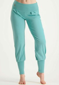 Urban Goddess DAKINI - Stoffhose - scarab