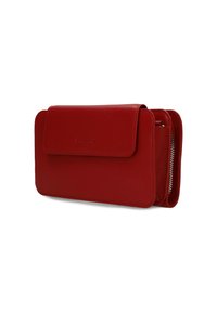 Red leather wallet with a flap closure, featuring a textured surface, zippered compartment, and embossed brand logo. Compact and structured design.