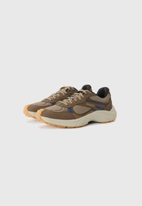 Brown athletic shoes featuring a mesh and synthetic upper, blue accents, a cushioned sole, and a textured gum rubber outsole.