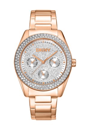 Orologio DKNY in oro rosa con quadrante argentato scintillante, tre sottodial, lunetta decorata con cristalli e bracciale in metallo a maglie.