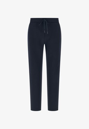 Marineblå joggingbukser lavet af blødt stof, med elastisk taljebånd med snøre og afsmalnende ben for en tætsiddende silhuet.