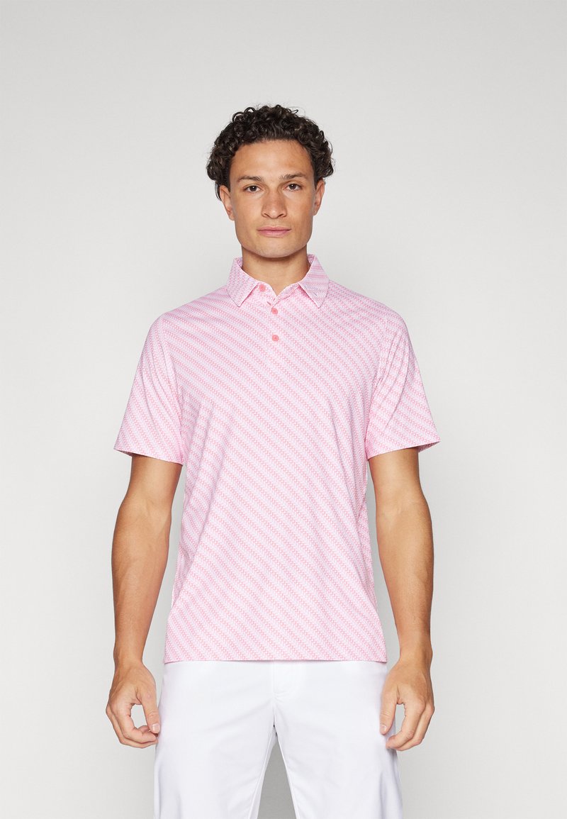 Short-sleeve polo shirt in light pink with a diagonal pattern. Features a classic collar and three-button placket. Smooth fabric texture.
