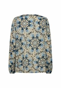 Maglietta a maniche lunghe realizzata in tessuto beige con un motivo a raggi di sole blu e nero, colletto rotondo e dettagli arricciati sulle maniche.