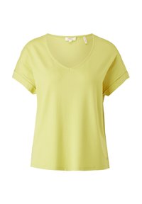 Chemise vert clair à manches courtes avec manches retroussées et col en V, présentée sur fond blanc.