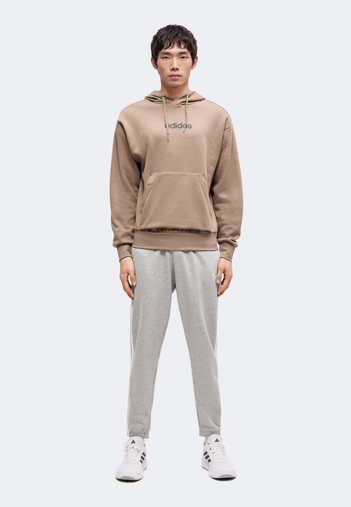 adidas ESSENTIALS 3 STRIPES TAPERED CUFFED PANTS - Tracksuit bottoms - medium grey heather/white — photo 2