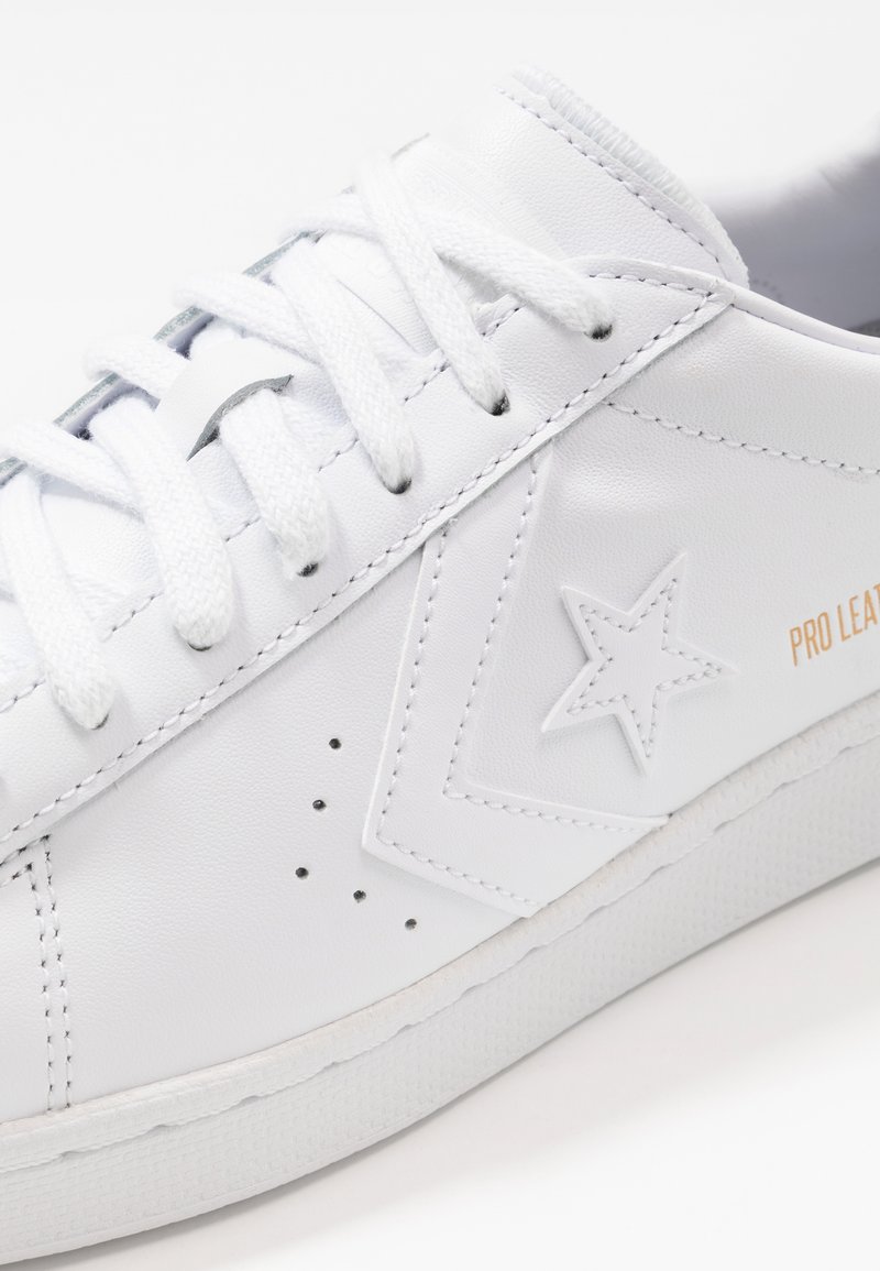 converse cuir blanc basse