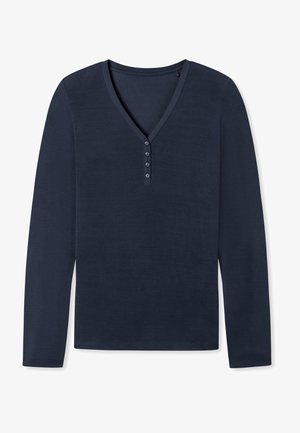 Chemise à manches longues col en V marine en tissu doux, dotée d'une patte de boutonnage avec cinq boutons et d'une texture lisse.