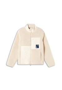 Cremefarbene Fleecejacke mit hohem Kragen, Reißverschluss und kontrastierendem, glattem Stoffeinsatz. Mit einem Logopatch auf der Brust.