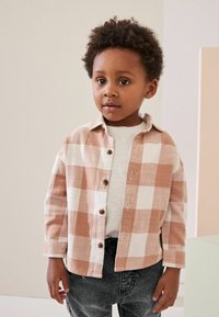 Next Pluus - rust brown