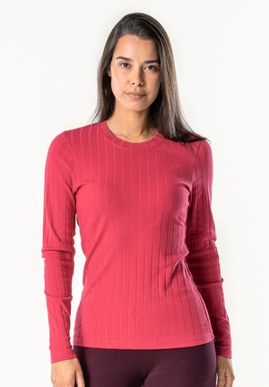 Langarm-Rippoberteil in tiefem Pink, mit rundem Ausschnitt und figurbetontem Schnitt, aus weichem, dehnbarem Material gefertigt.